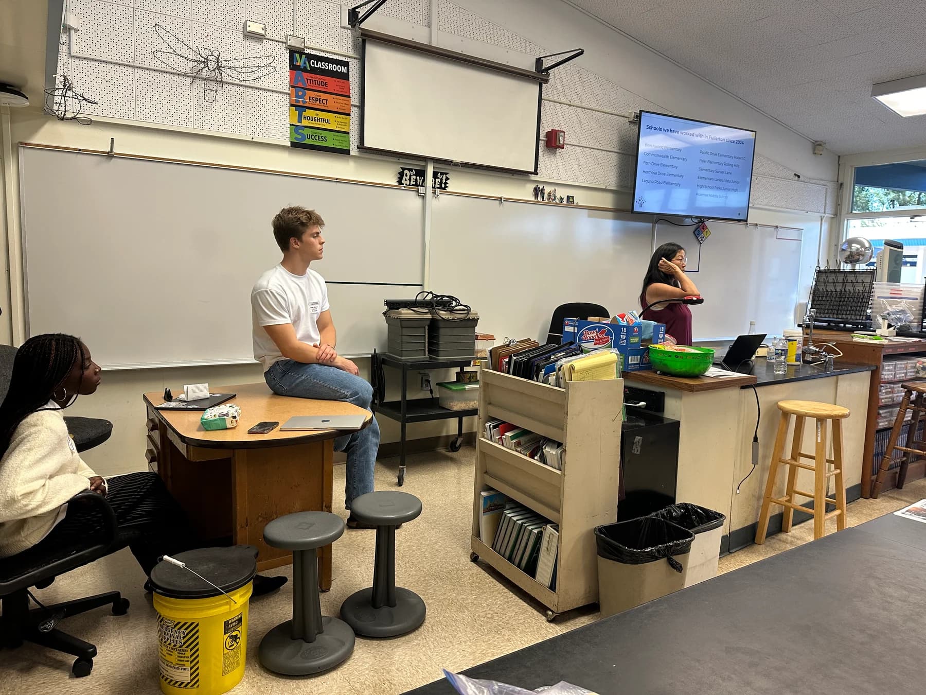 Sharing the lab’s work during a classroom presentation